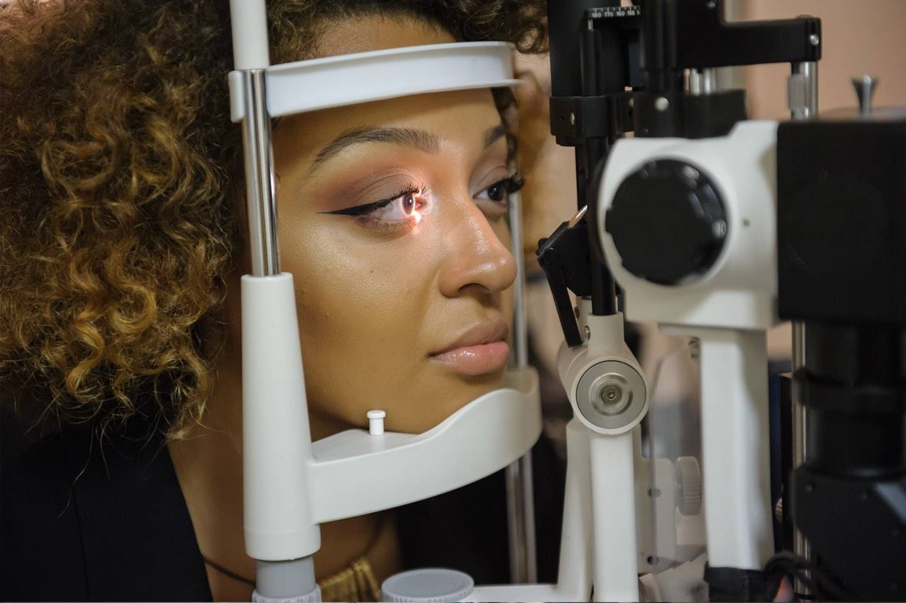 woman getting eyes checked