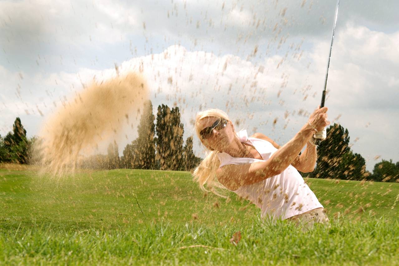 Woman playing golf