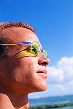 man wearing glasses in the sun